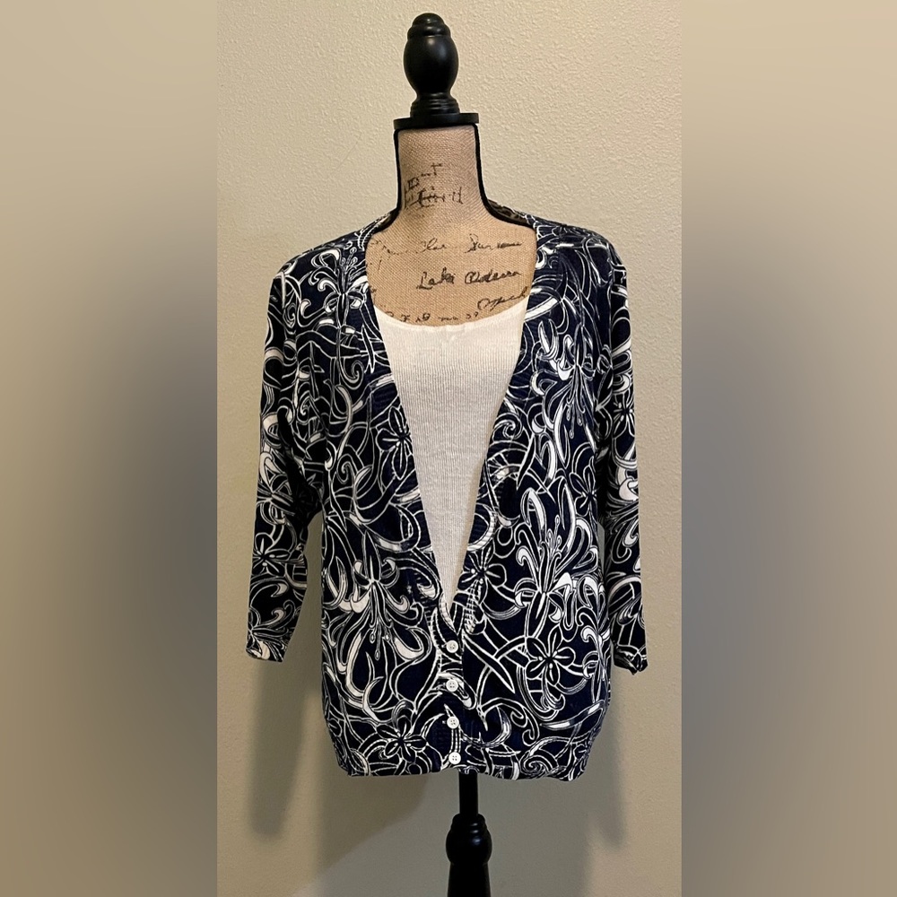 Kathy Daniels. Six XL blue and white sweater.